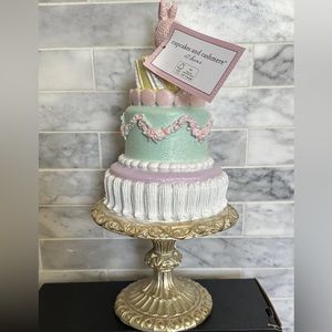 Cupcakes and Cashmere tiered macarons Easter Cake bunny on top